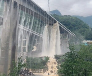 Water Cascades Down From Under-Construction Bridge