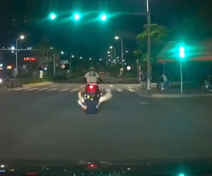 Biker Fails To Impress Girlfriend With Stunt As She Falls Off The Back Onto Road