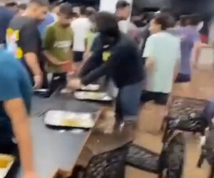 Startling Video Shows University Students Having Lunch In Canteen Flooded With Rainwater