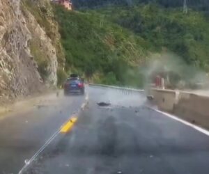 Motorist Narrowly Dodges Sudden Rockfall On Mountain Road