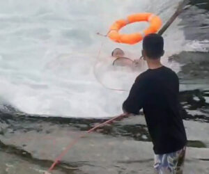 Young Man Lassoes Drowning Woman To Safety