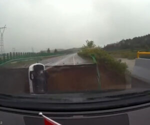 Driver Plunges Into Flooded River As Bridge Gives Way After Heavy Rainfall