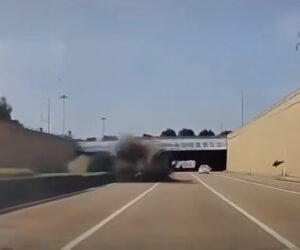 Out-Of-Control Car Flies Over Median Strip And Crashes Into Two Vehicles On Busy Motorway