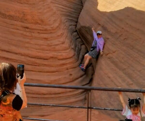 Woman Sparks Outrage For Climbing Protected Landform Site For Photos