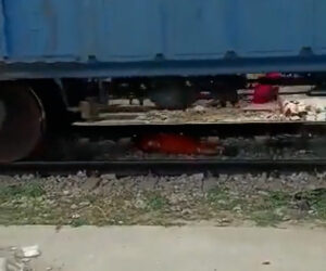 Girl Trapped On Tracks Under Massive Cargo Train