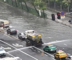 Residents Baffled As Cleaning Lorry Sprays Flooded Street With Water