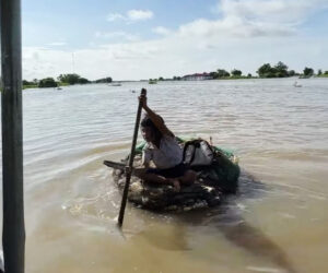  Eight-Year-Old Girl Paddles Half A Mile On Raft Built From Garbage To Get To School