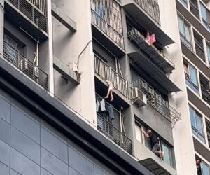 Neighbour Risks Life To Help Save Little Girl Hanging By Head From Balcony