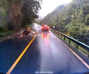 Driver Narrowly Escapes Huge Boulder That Tumbles Down The Mountain