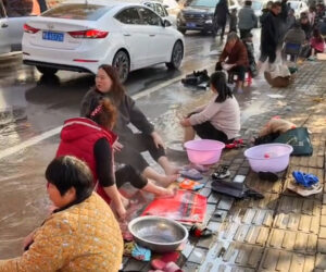  Locals Take Footbaths And Do Laundry In City Streets Flooded By Hot Springs