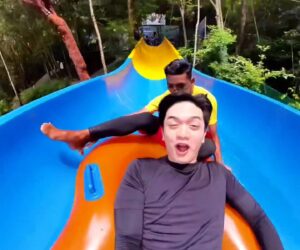 Moment Lifeguard Accidentally Joins Man On Long Waterslide Instead Of GF