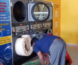 Couple Caught Stuffing Mattress Into Laundry Dryer