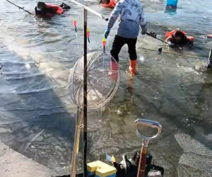 Footage Shows Moment Fishermen Being Stuck In Reservoir After Falling Through Thin Ice