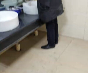 Netizens Shocked After Man Styles Hair With Lighter In Public Restroom
