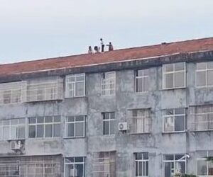 Woman Yells At Children Playing On Top Of Six-Storey Building