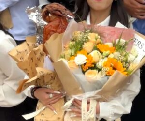 Young Woman Gets Roasted Duck For Graduation Ceremony